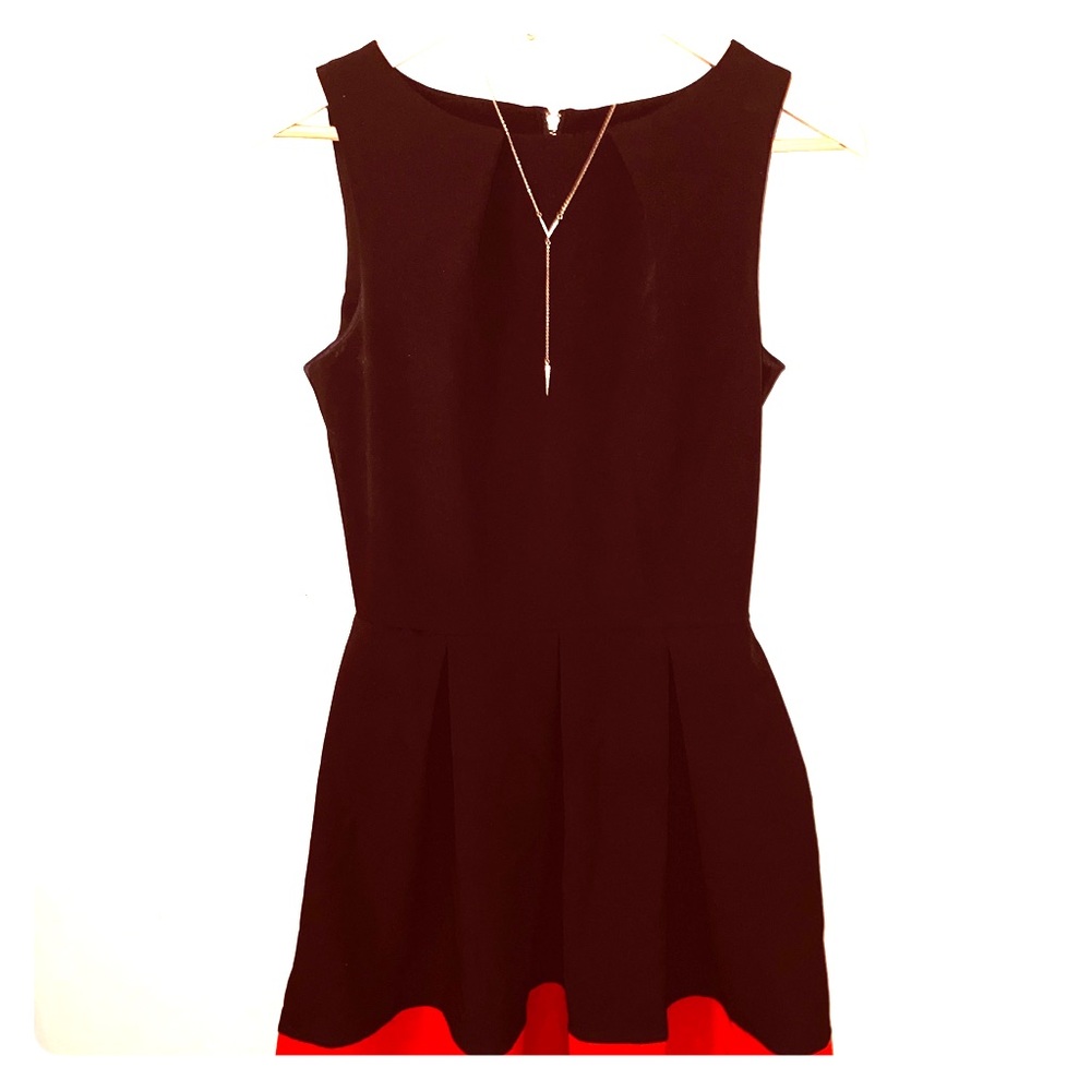 Perfect little black dress with a pop of color
